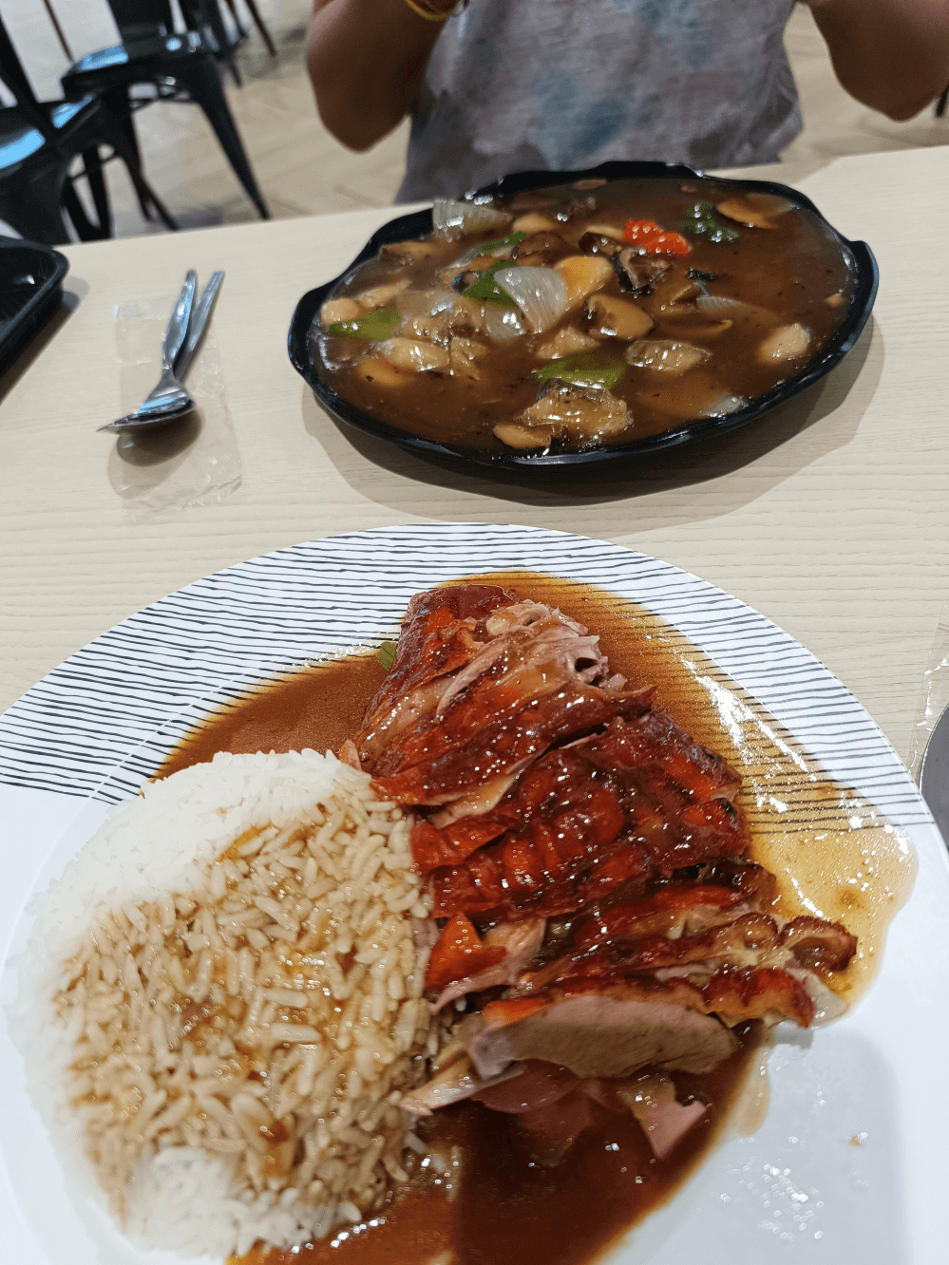 Budget Bangkok street food: Crispy roasted duck with jasmine rice in Ari neighborhood