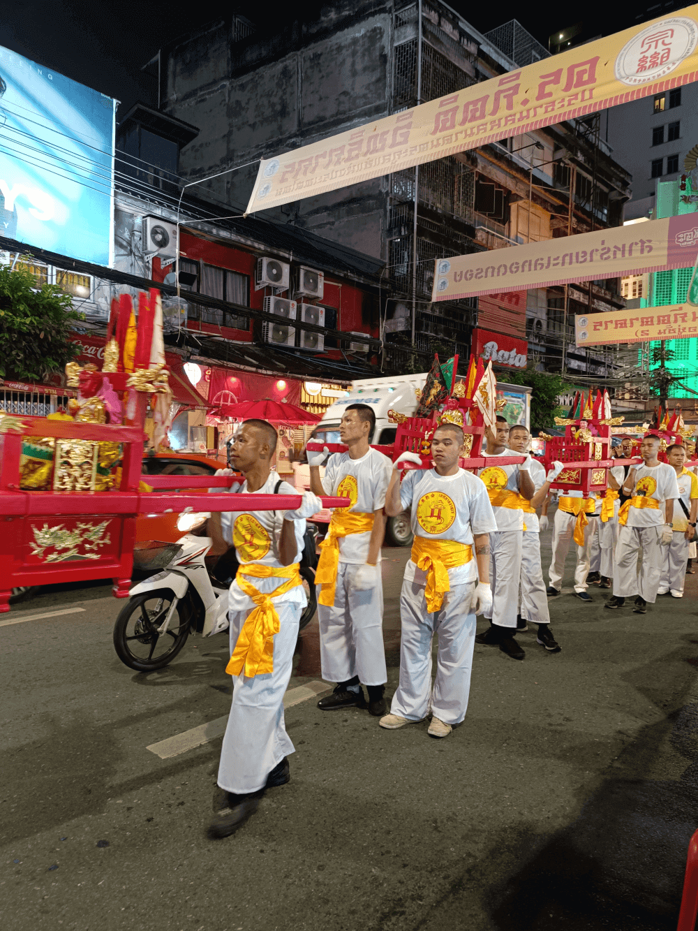 Free things to do in Bangkok: Traditional Chinese festival procession in Yaowarat Chinatown with locals in white attire