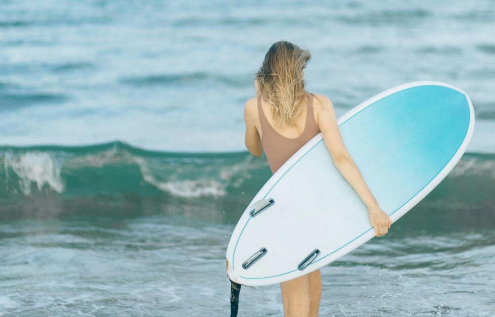 Funboard or mini-Malibu surfboard — versatile mid-length board for progressing beginners and weekend surfers