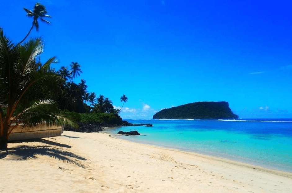 Lalomanu Beach Samoa – soft sand, volcanic peaks, traditional beach fale