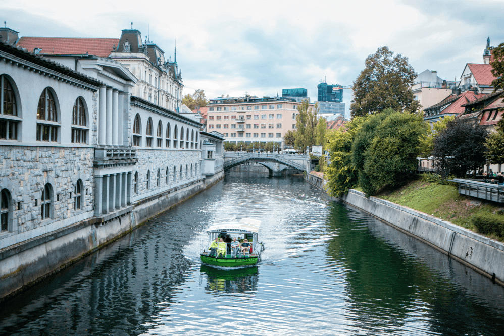 Best European city for families: River cruise on Ljubljanica River — calm, scenic, and perfect for toddlers in strollers