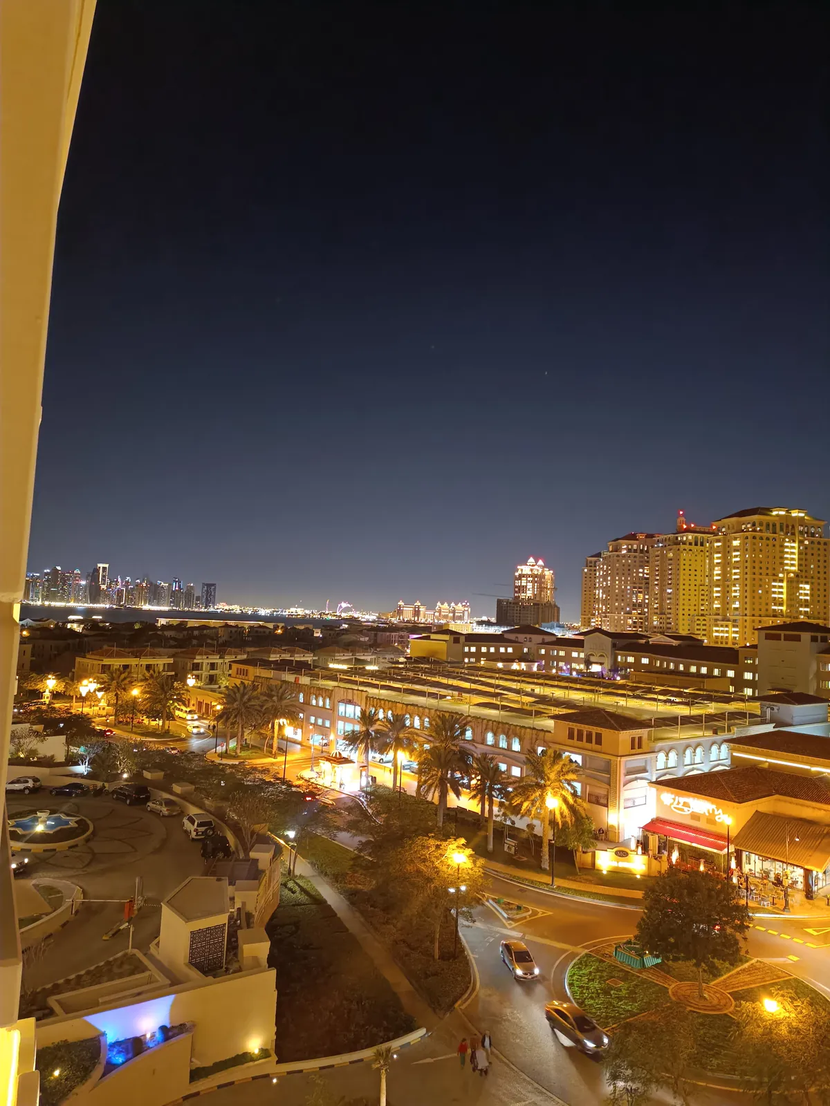 Night city view from a balcony while living abroad alone in Doha, Qatar