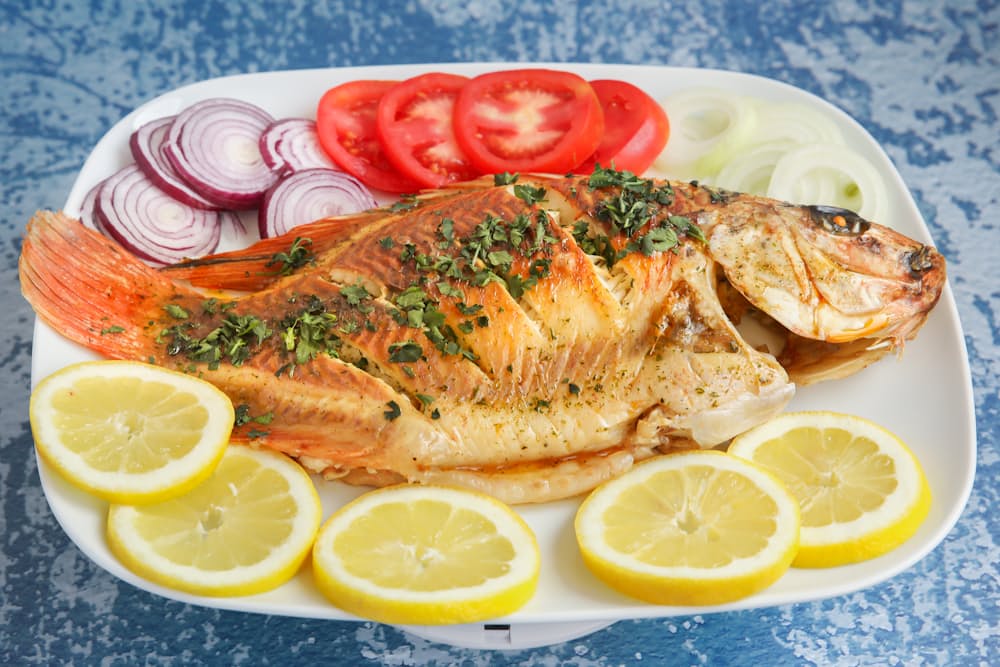 Fish cooked in an umu earth oven, the traditional Niuean method