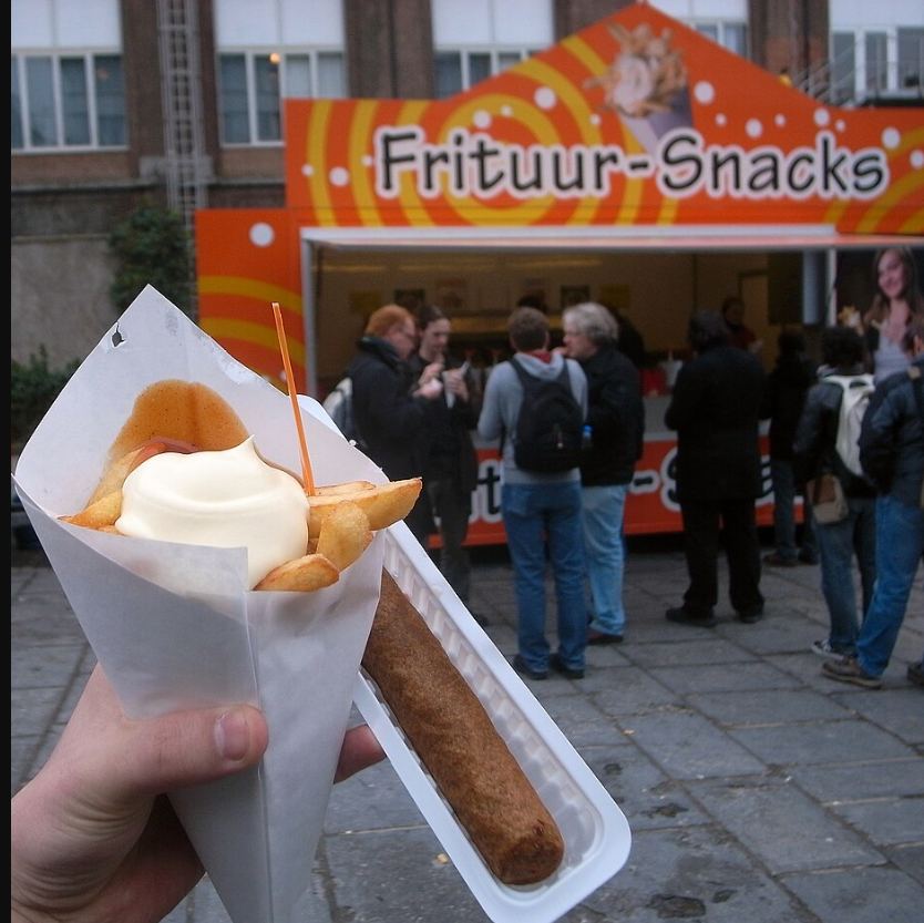 Belgian fries in a paper cone, likely the true birthplace of french fries