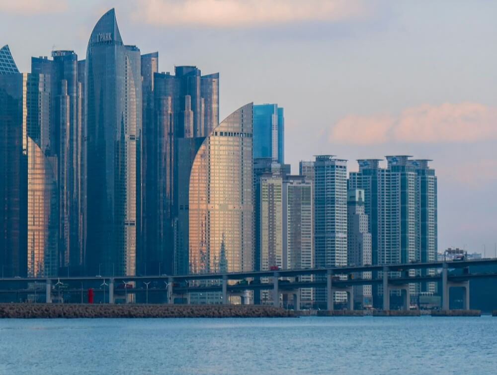 Seoul skyline at golden hour — modern cityscape showing family-friendly districts like Gangnam and Hongdae for traveling South Korea with kids
